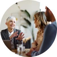 Real estate professional talking to couple