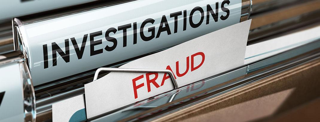 file drawer with folders for fraud and investigations