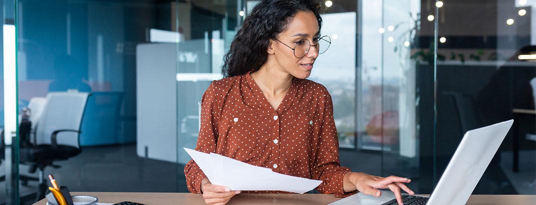 Professional working at her desk in an office